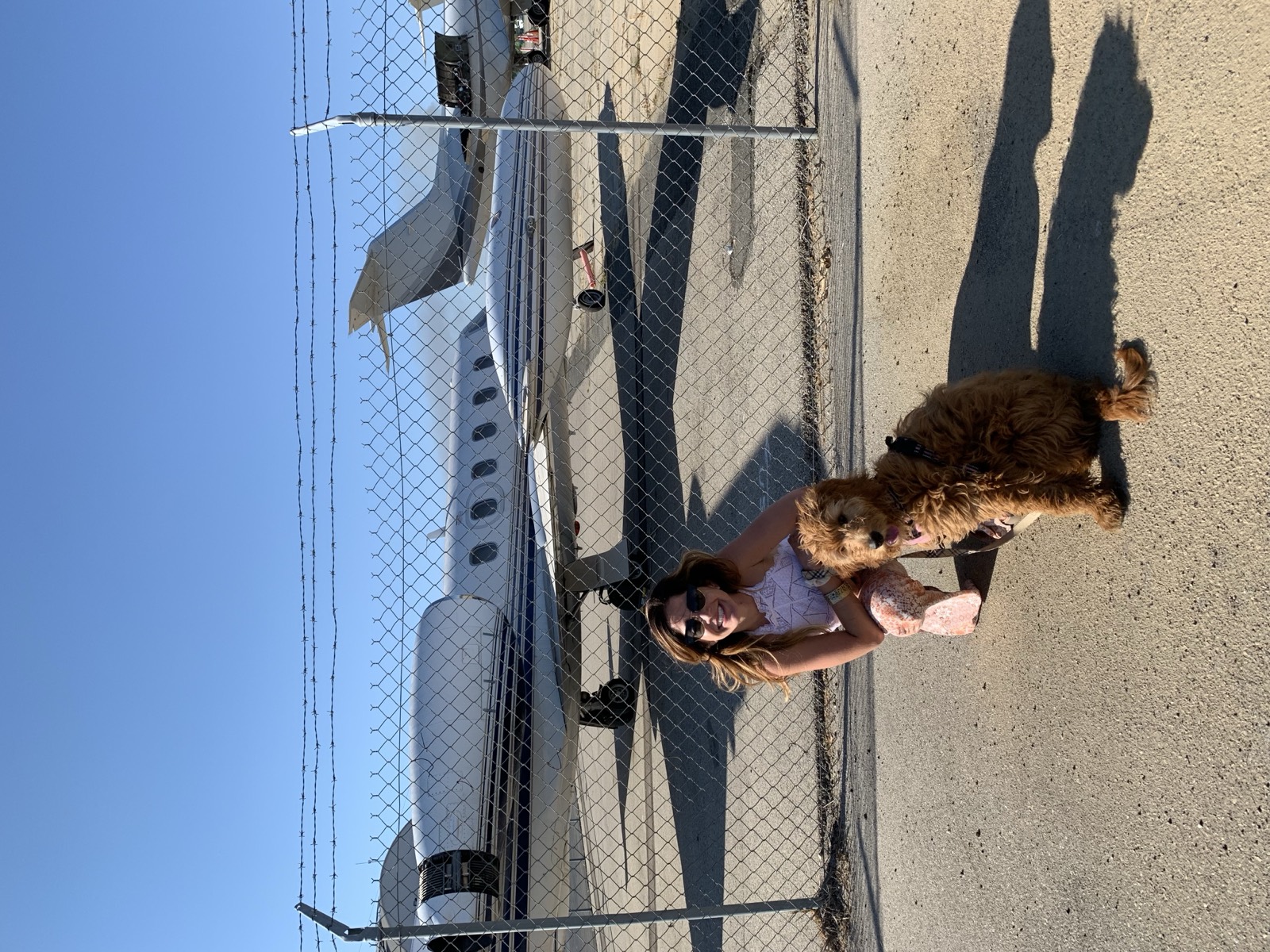 Peach as a puppy at Van Nuys Airport with her handler Lauren Pena